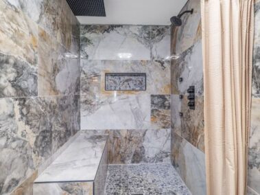 Walkin shower with bench and raindrop head and body sprays Bluetooth music